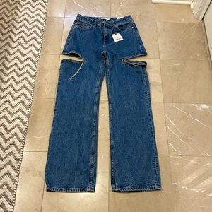 Zara jeans, new w tags. A fun cut-out on the sides w rhinestones.